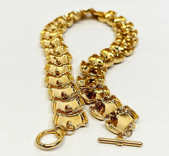 Chunky gold tone metal statement link style necklace.