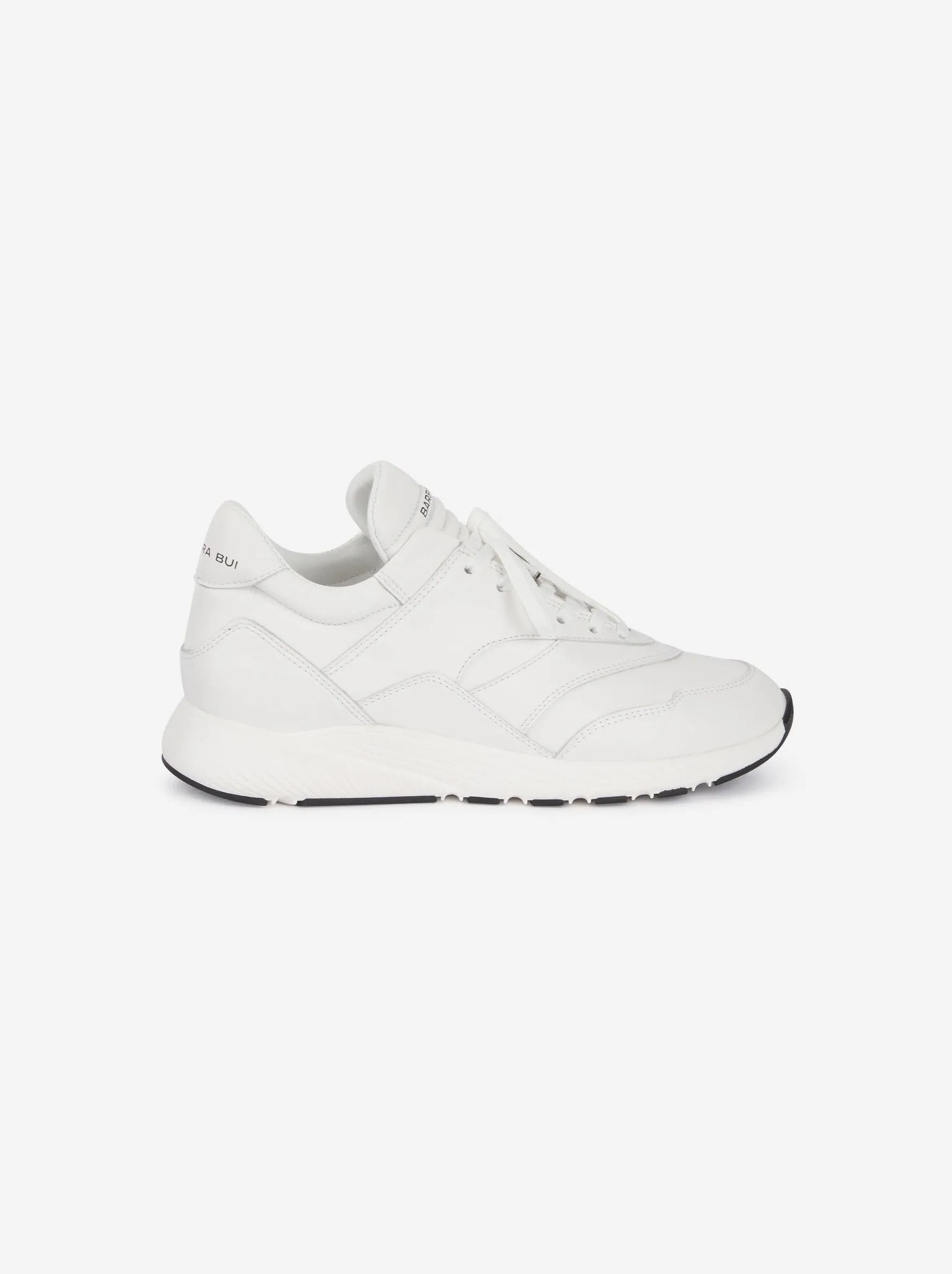 White leather running shoes