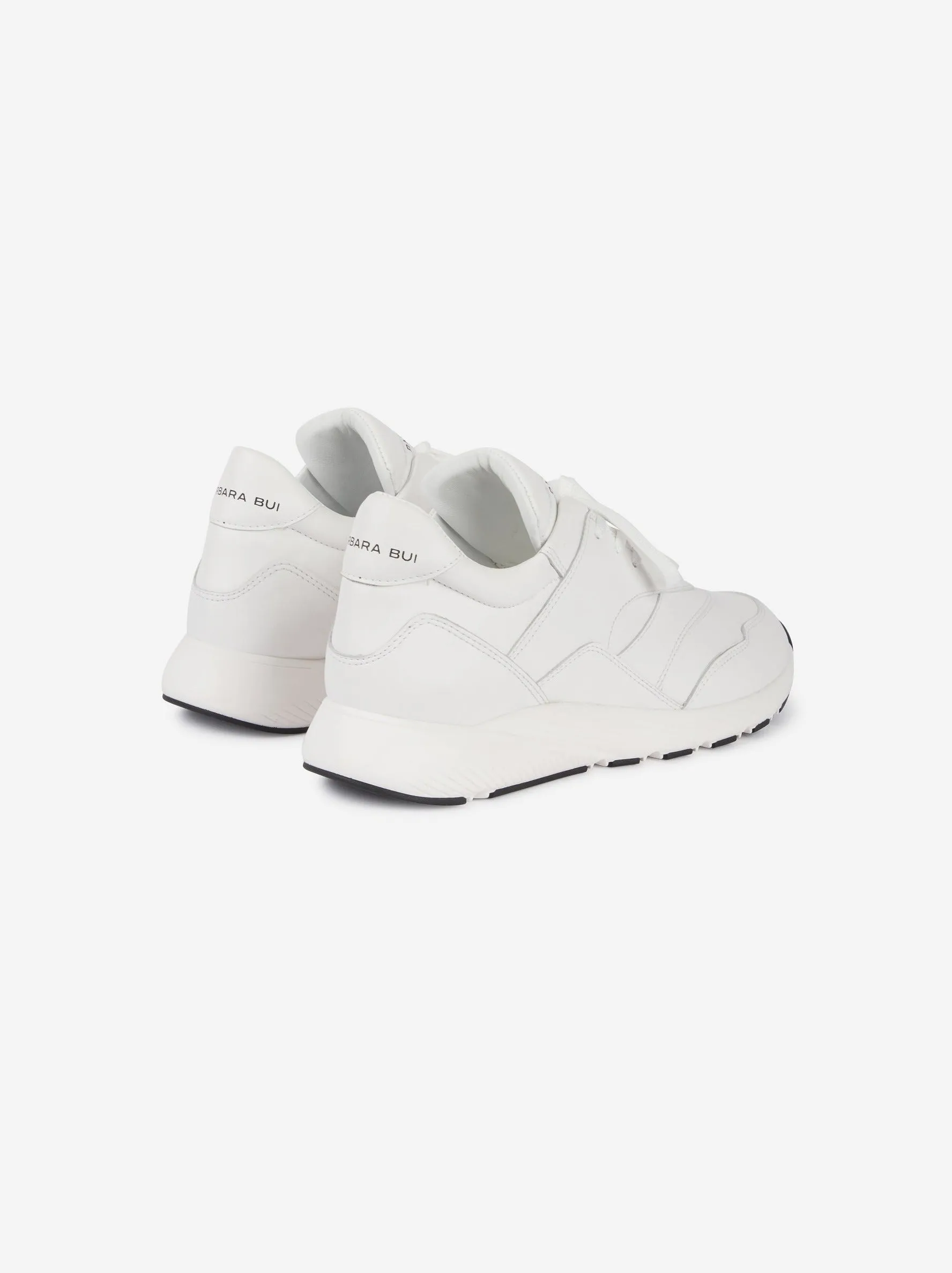 White leather running shoes